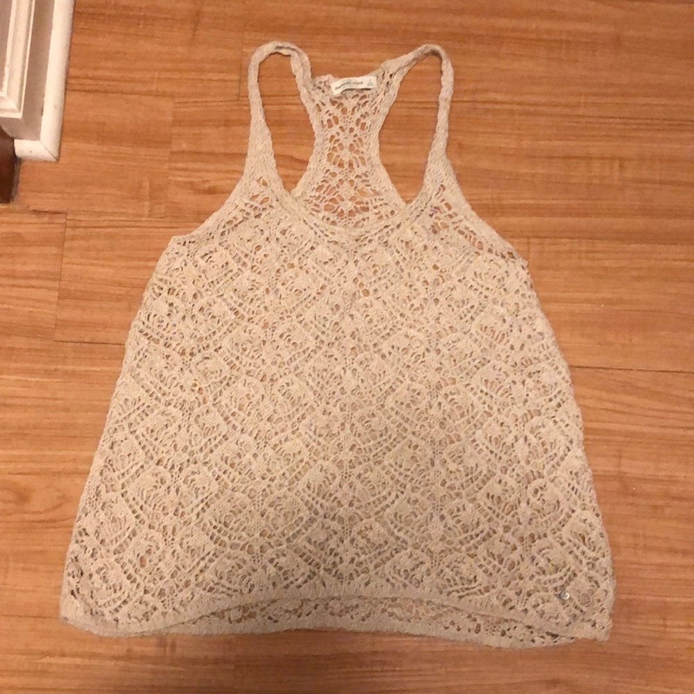 Abercrombie & Fitch Tank. Small but would fit a medium.